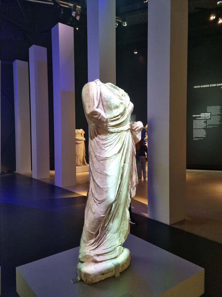 An ancient Greek marble statue of a draped woman